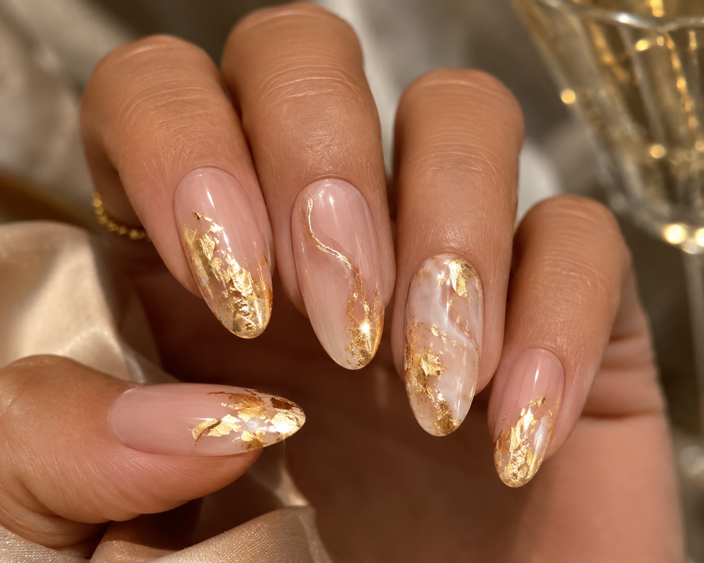 Nude nails with gold foil and marble nail art